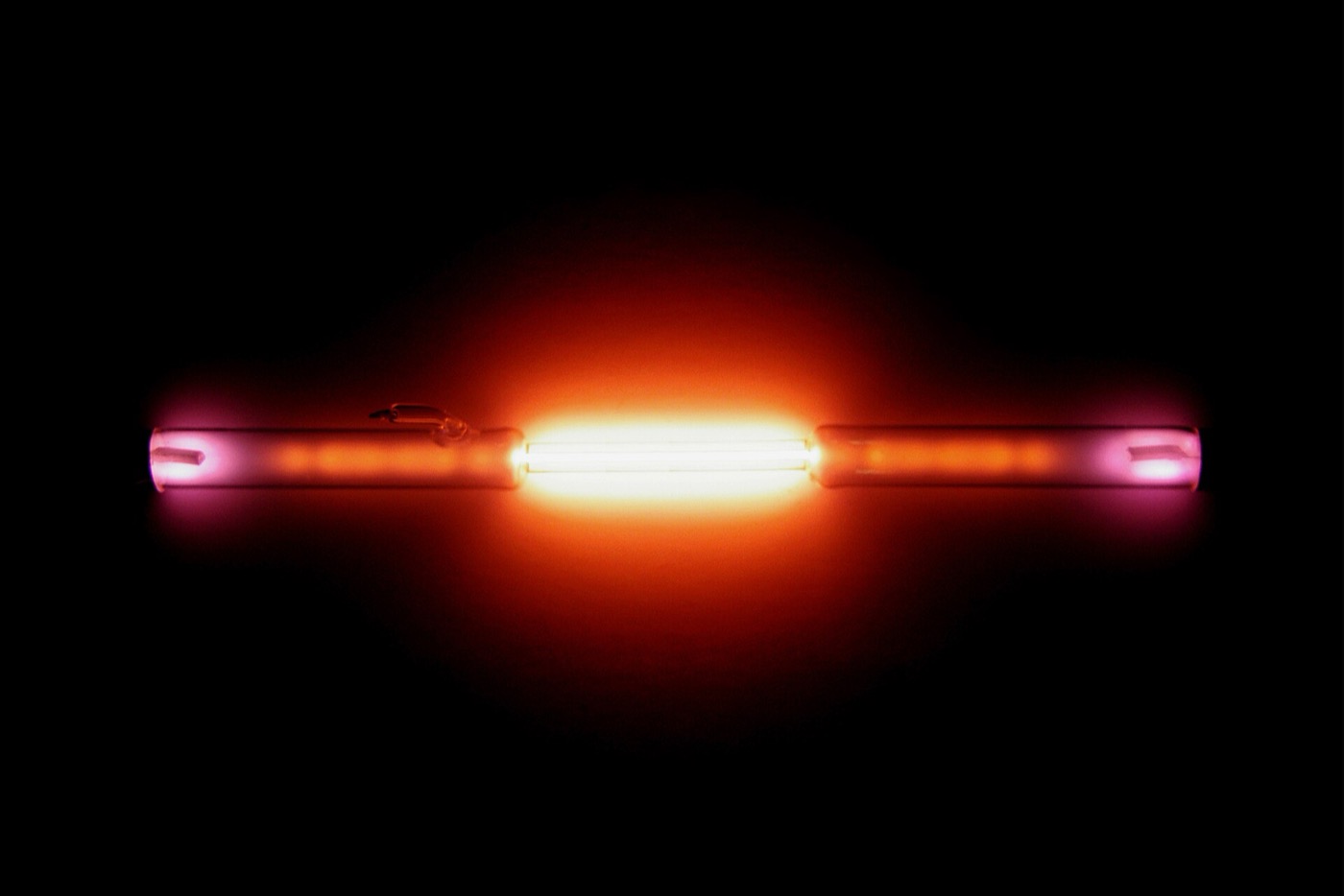 Helium glowing in a gas discharge tube