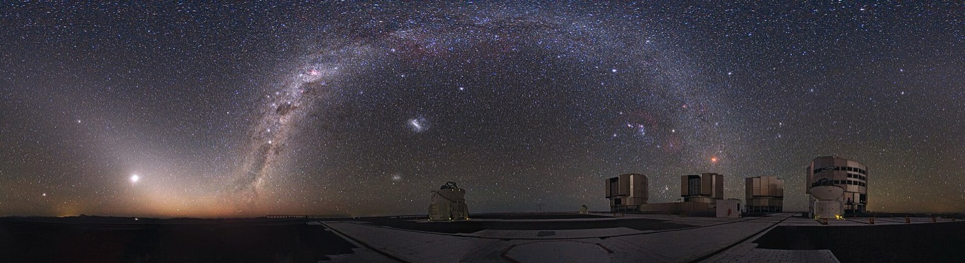 Telescopes under a dark night sky at ESO's Paranal Observatory